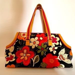 Isabella Fiore purse.  Beaded zipper closure. Back pocket  floral